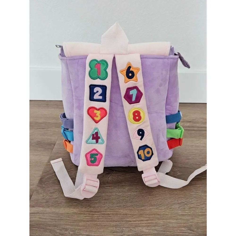 White Dolphin Toys Kids Busy Board Backpack in Lavender and Pink